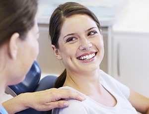 Smiling woman in dental chair