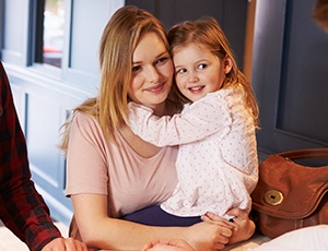 Smiling mother and daughter