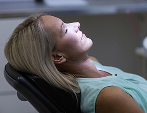 Relaxed woman in dental chair