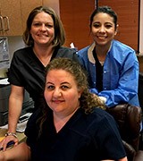 Richardson dental team members smiling together