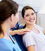 Smiling woman in dental chair