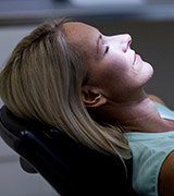 Relaxed woman in dental chair