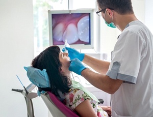 woman getting professional dental cleaning
