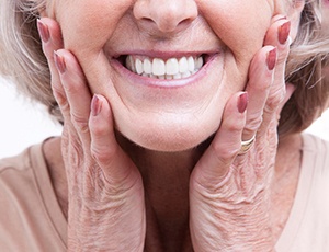  smiling woman enjoying her dentures