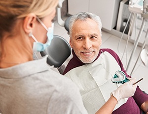 An elderly man getting dentures in Richardson