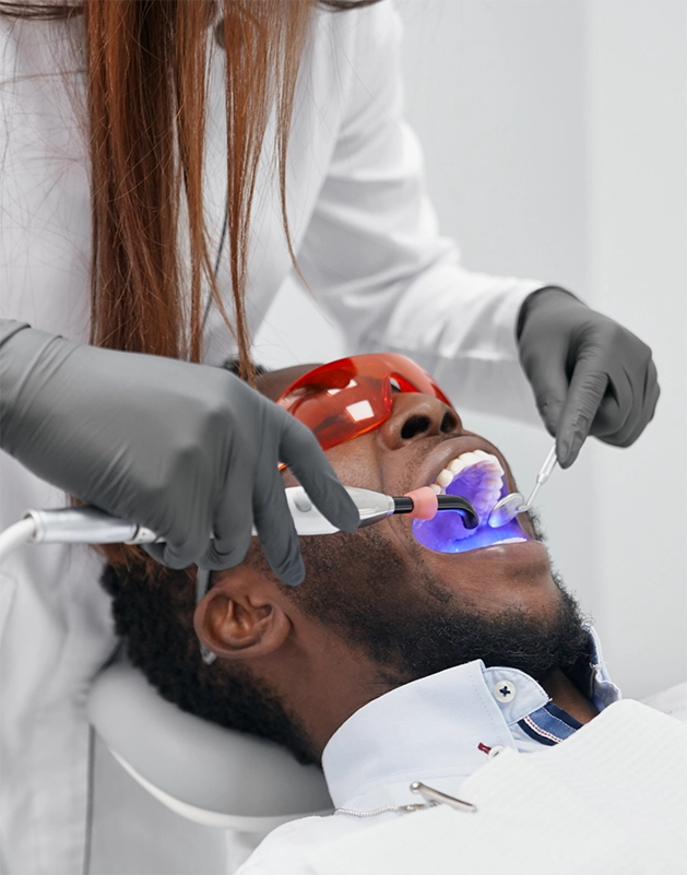 Man undergoing dental bondinh