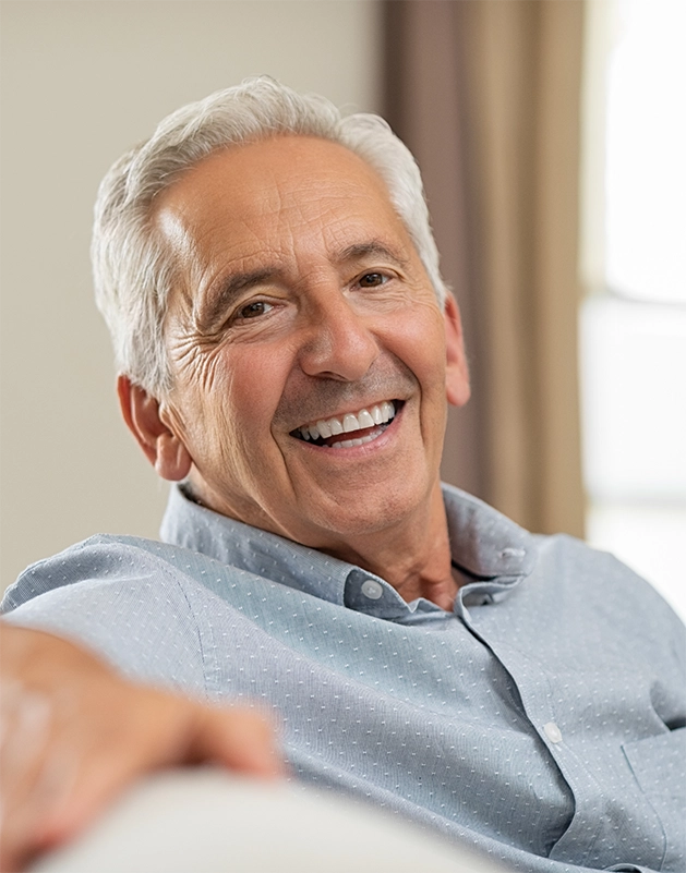 Senior man sitting on a couch