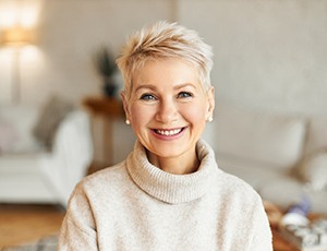 Woman with dental implants in Richardson 