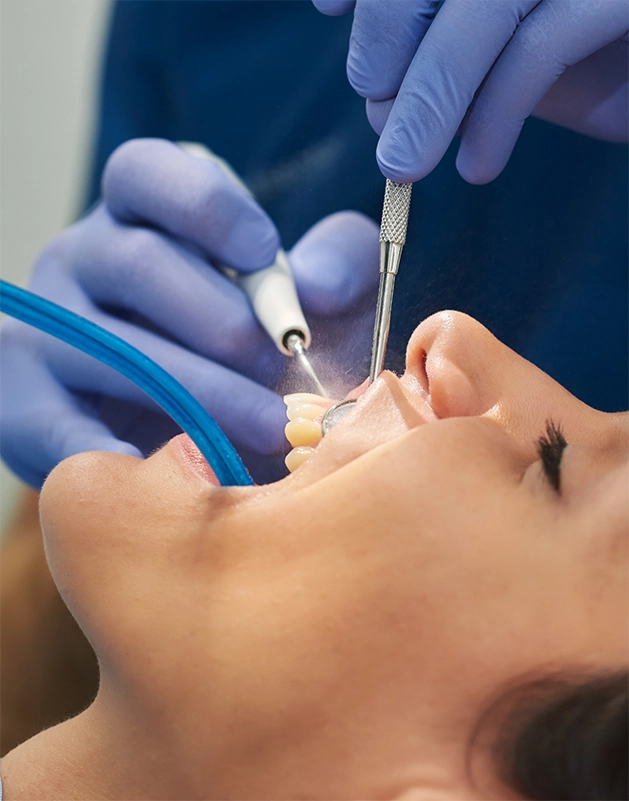Woman getting a dental cleaning