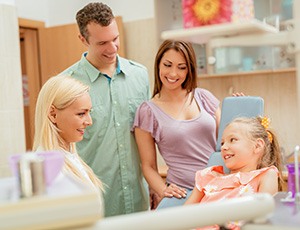 Young family visiting the dentist’s office