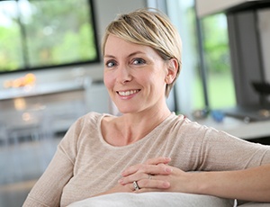 Woman smiling after root canal therapy