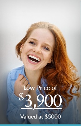 Smiling woman with text for $3900 orthodontics coupon