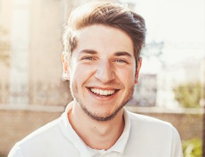 Smiling man after orthodontic treatment