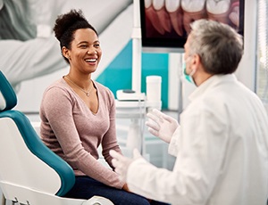 patient meeting with a dentist regularly