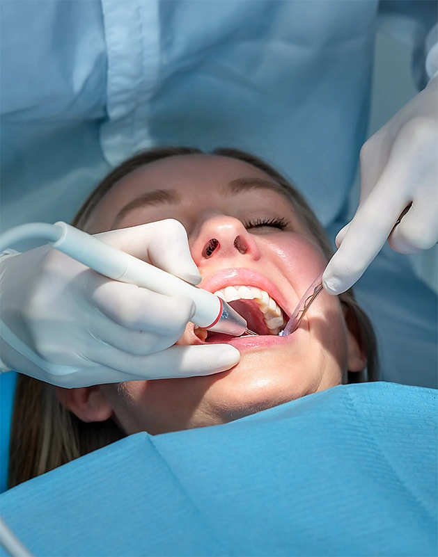 Woman getting a dental cleaning