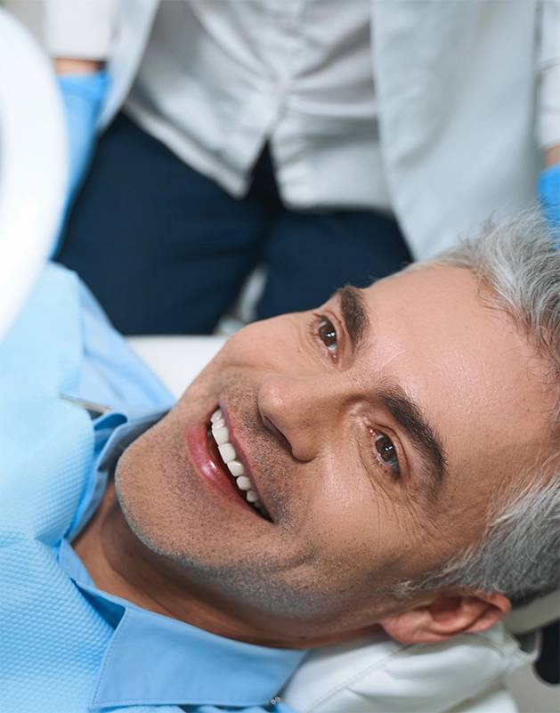 Man smiling in the dental chair