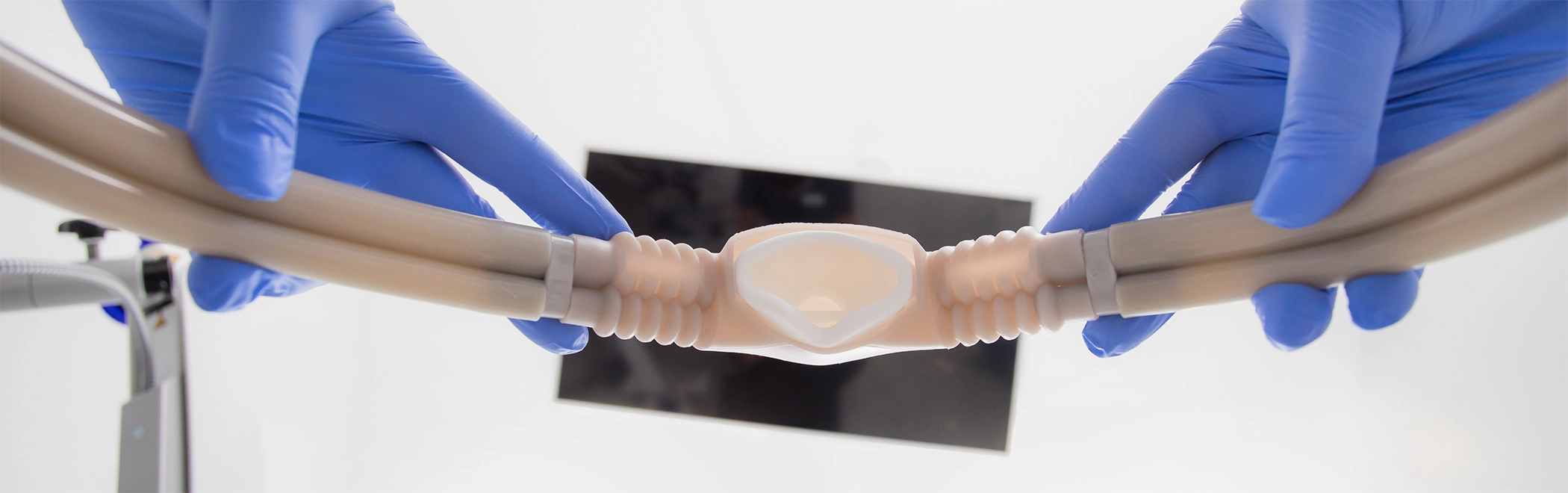 Sedation dentist holding a nitrous oxide mask