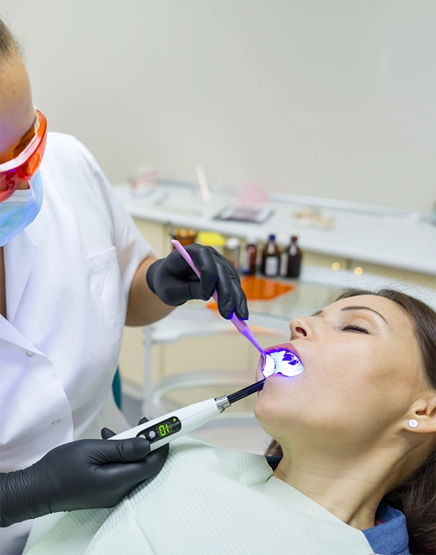 Woman looking relaxed while getting dental work done