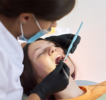 Woman undergoing a dental procedure