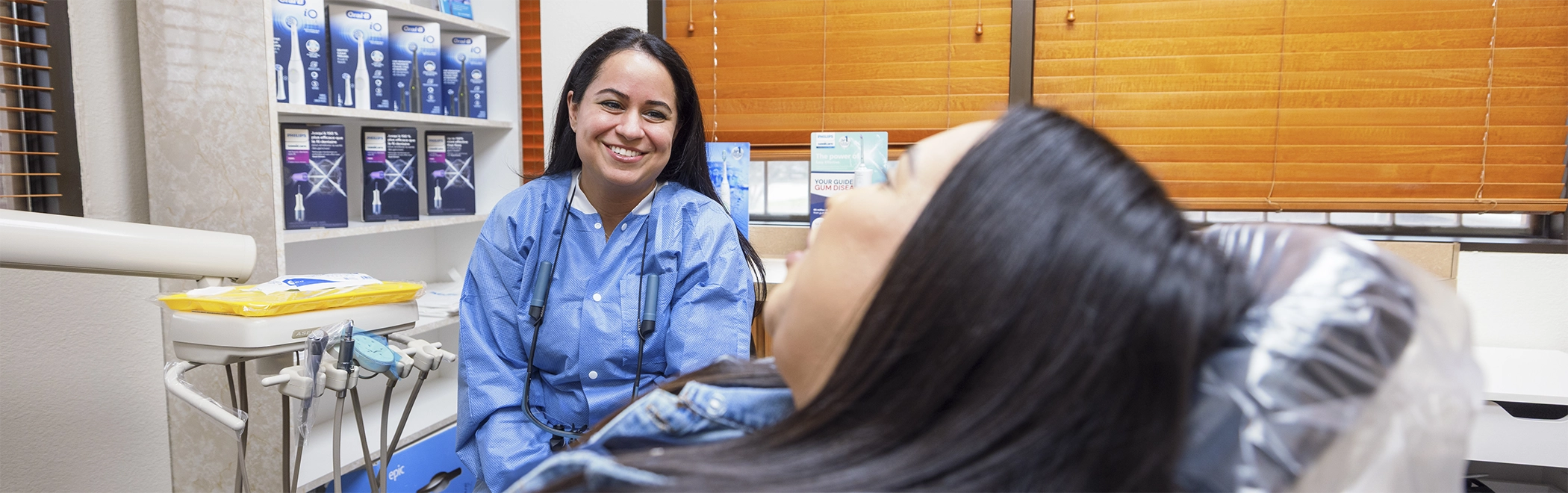 Richardson dental team member grinning at a patient