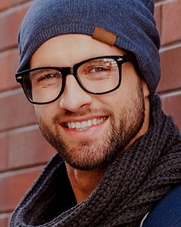 Smiling young man wearing beanie