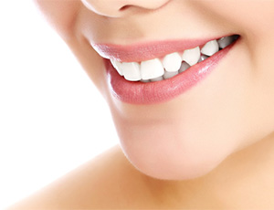 Closeup of attractive smile with porcelain veneers