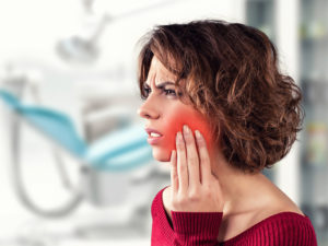 Woman with tooth pain