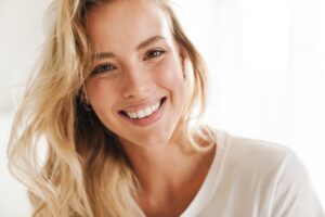 Woman showing beautiful smile. 