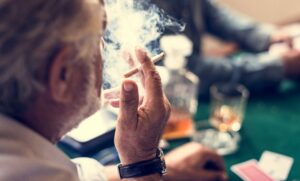 Older man smoking 