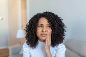 Woman experiencing tooth pain